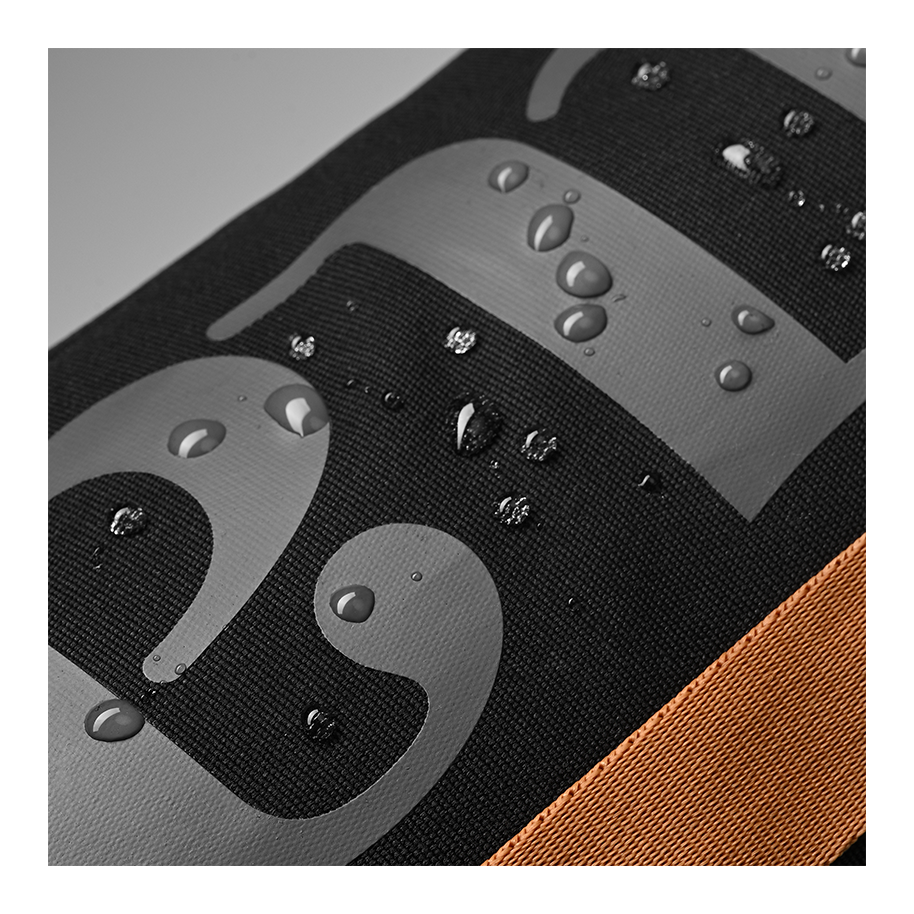 Ritual Tactic combo hockey bag black with water droplets, featuring a black and brown design